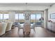 Bright dining area with scenic city views, stylish seating, and hardwood flooring at 4200 W 17Th Ave # 912, Denver, CO 80204