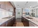 Modern kitchen featuring stainless steel appliances, granite countertops, modern lighting and wood floors at 4200 W 17Th Ave # 912, Denver, CO 80204