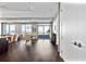 Bright and airy living room featuring an open floor plan and hardwood floors at 4200 W 17Th Ave # 912, Denver, CO 80204