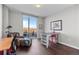 Office space with hardwood floors and access to a balcony with mountain views at 4200 W 17Th Ave # 912, Denver, CO 80204