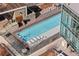 An inviting outdoor pool with lounge chairs offering a perfect spot for relaxation and enjoyment in the sun at 4200 W 17Th Ave # 912, Denver, CO 80204