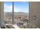 Stunning city and mountain views from a large window at 4200 W 17Th Ave # 912, Denver, CO 80204