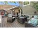 Outdoor patio featuring comfortable seating, a fire pit, and elegant decor at 760 Deframe St, Golden, CO 80401