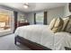 Comfortable bedroom features plush carpet and access to patio at 760 Deframe St, Golden, CO 80401