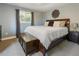 Comfortable bedroom features plush carpet, neutral decor, and natural light at 760 Deframe St, Golden, CO 80401
