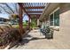 View of the stamped concrete patio, landscaping and seating area at 760 Deframe St, Golden, CO 80401