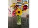 Beautiful fresh flower arrangement in a clear vase, adding a touch of elegance to the home decor at 760 Deframe St, Golden, CO 80401