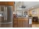 Contemporary kitchen with stainless steel appliances, island, and open layout at 760 Deframe St, Golden, CO 80401