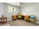 Bright office space featuring a corner desk, natural light, and comfortable seating at 760 Deframe St, Golden, CO 80401