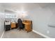 Dedicated office space with a desk setup, neutral walls, and a window bringing in natural light at 760 Deframe St, Golden, CO 80401