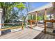 Relax on the back porch swing and enjoy the backyard views, with grassy area and privacy fence at 359 S 25Th Ave, Brighton, CO 80601