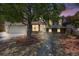 Charming home with a well-maintained lawn and mature trees creating a welcoming curb appeal at 359 S 25Th Ave, Brighton, CO 80601