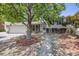 Charming home with a well-maintained lawn and mature trees creating a welcoming curb appeal at 359 S 25Th Ave, Brighton, CO 80601