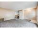 Bright and airy living room with plush carpeting and neutral walls, providing a versatile living space at 359 S 25Th Ave, Brighton, CO 80601