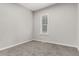 Bedroom with neutral walls, carpet and a window that brings in ample light at 725 Knox Ct, Denver, CO 80204