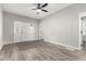 Bright living room with modern flooring, white walls, and ample natural light at 725 Knox Ct, Denver, CO 80204