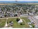 Aerial view showcasing a home's location relative to I-25 and the wider community at 5602 County Road 15, Fort Lupton, CO 80621