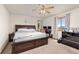 Spacious bedroom featuring a king size bed, natural light, and ample closet space at 5602 County Road 15, Fort Lupton, CO 80621
