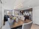 Bright and airy dining area with hardwood floors at 5110 E 64 Ave, Commerce City, CO 80022