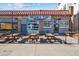 Outdoor patio seating for Rocky Top Tavern, featuring picnic tables at 4911 Lowell Blvd # 102, Denver, CO 80221