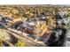 Aerial view showing a townhouse in a neighborhood, snow on the ground at 3851 Stonebrush Dr # 11B, Littleton, CO 80126