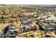 Aerial view of a townhouse community with snow-covered rooftops at 3851 Stonebrush Dr # 11B, Littleton, CO 80126
