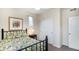 Cozy bedroom with a full-size bed, and a double door closet at 3851 Stonebrush Dr # 11B, Littleton, CO 80126