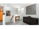 Bright hallway with built-in desk and decorative wall art at 3851 Stonebrush Dr # 11B, Littleton, CO 80126