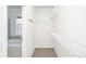 Large walk-in closet with wire shelving and hanging rods at 3851 Stonebrush Dr # 11B, Littleton, CO 80126
