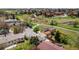 Aerial view of a neighborhood near a green space at 17753 E Nassau Pl, Aurora, CO 80013
