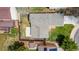Aerial view of home with gray roof, green lawn, and fenced yard at 17753 E Nassau Pl, Aurora, CO 80013
