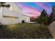 Spacious backyard with trees and a fence at 17753 E Nassau Pl, Aurora, CO 80013