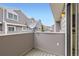 Balcony of a property with views of neighboring buildings and a satellite dish at 6670 W 84Th Cir # 99, Arvada, CO 80003