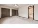 This bedroom features a private ensuite bathroom and dual closets, providing ample storage and convenience at 6670 W 84Th Cir # 99, Arvada, CO 80003