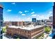 Stunning city view showcases architectural brick buildings and expansive blue skies, offering an urban charm at 1863 Wazee St # 4B, Denver, CO 80202