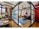 Comfortable living room area with exposed brick, hardwood floors, and a stylish seating area at 1863 Wazee St # 4B, Denver, CO 80202