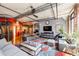 Spacious living room with exposed pipes, hardwood floors, and modern furniture at 1863 Wazee St # 4B, Denver, CO 80202