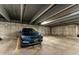 Well lit parking garage featuring parking spaces for cars and bicycles, ensuring safe and convenient access at 1863 Wazee St # 4B, Denver, CO 80202