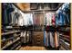 Spacious walk-in closet with custom shelving and hanging racks for organization and storage at 1863 Wazee St # 4B, Denver, CO 80202