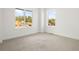 Spacious bedroom with large windows and carpeted floor at 4660 W 9Th Ave, Denver, CO 80204