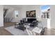 Open living room showcasing hardwood floors and stylish furniture at 4660 W 9Th Ave, Denver, CO 80204