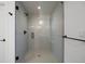 Spacious shower with glass enclosure and modern tile at 4660 W 9Th Ave, Denver, CO 80204