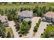 This aerial view highlights the home's manicured yard, tiled roof, and generous spacing from neighboring houses at 5665 Vistancia Ct, Parker, CO 80134