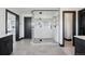 Modern bathroom with a glass-enclosed shower, stylish tile, and sleek fixtures, offering a spa-like experience at 5665 Vistancia Ct, Parker, CO 80134