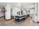 This gourmet kitchen features a large island with seating, custom cabinets, and professional-grade appliances at 5665 Vistancia Ct, Parker, CO 80134
