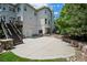 A walkout patio features stairs to the deck and leads to a beautifully landscaped yard with mature trees at 5665 Vistancia Ct, Parker, CO 80134