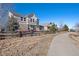 Charming back exterior view of a home with outdoor seating, a fenced yard, and a scenic walking path at 3395 Starry Night Loop, Castle Rock, CO 80109