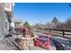 Outdoor patio with a fire pit, seating area, and scenic views at 3395 Starry Night Loop, Castle Rock, CO 80109