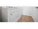 Laundry room with Whirlpool washer and dryer at 3000 Blue Sky Cir # 11-108, Erie, CO 80516