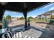 Inviting backyard gazebo overlooks the lawn, with comfortable seating and a scenic view at 504 Branding Iron Ct, Brighton, CO 80601